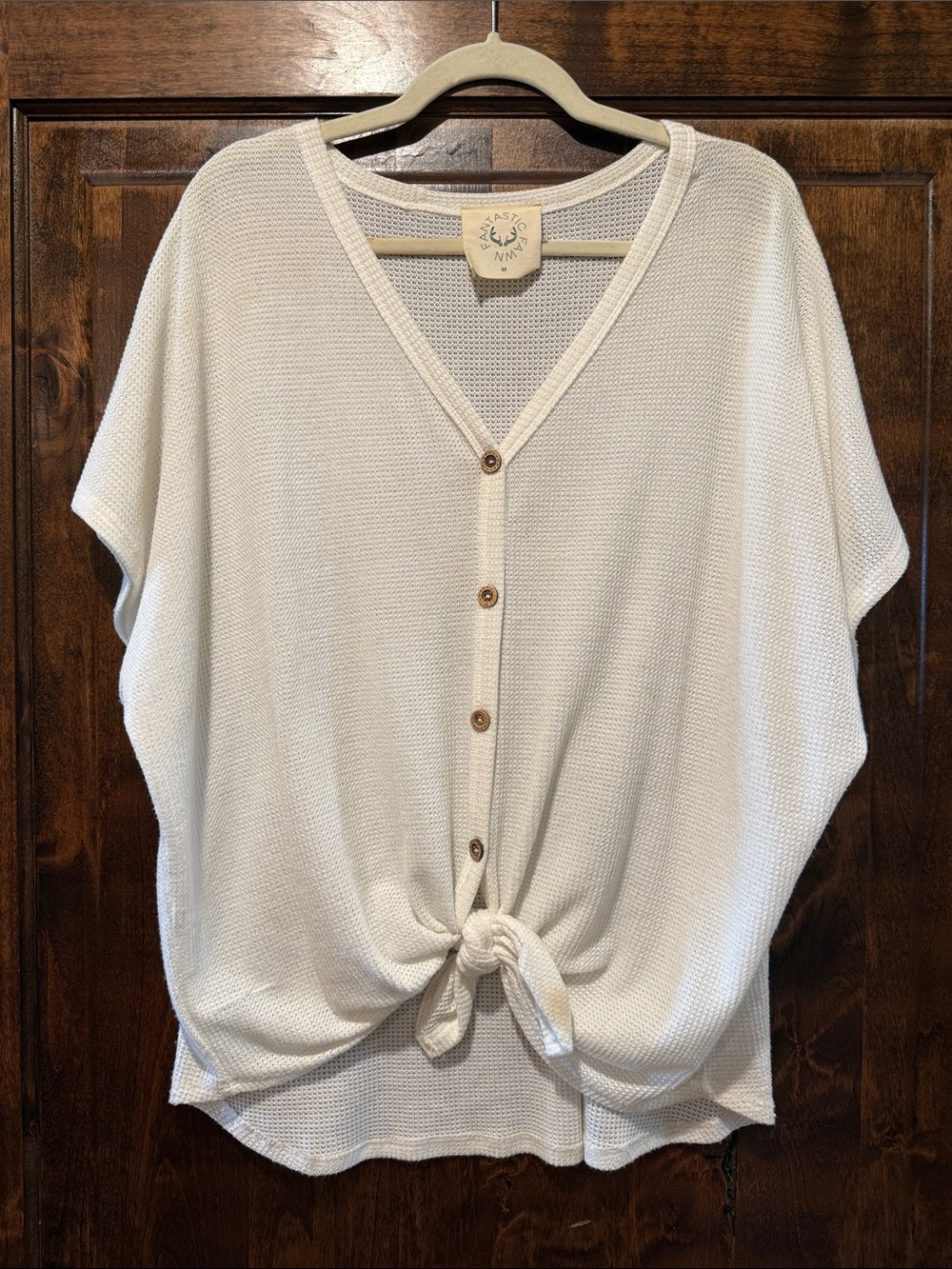 Fantastic Fawn Cream Button-Front Tie Hem Knit Top